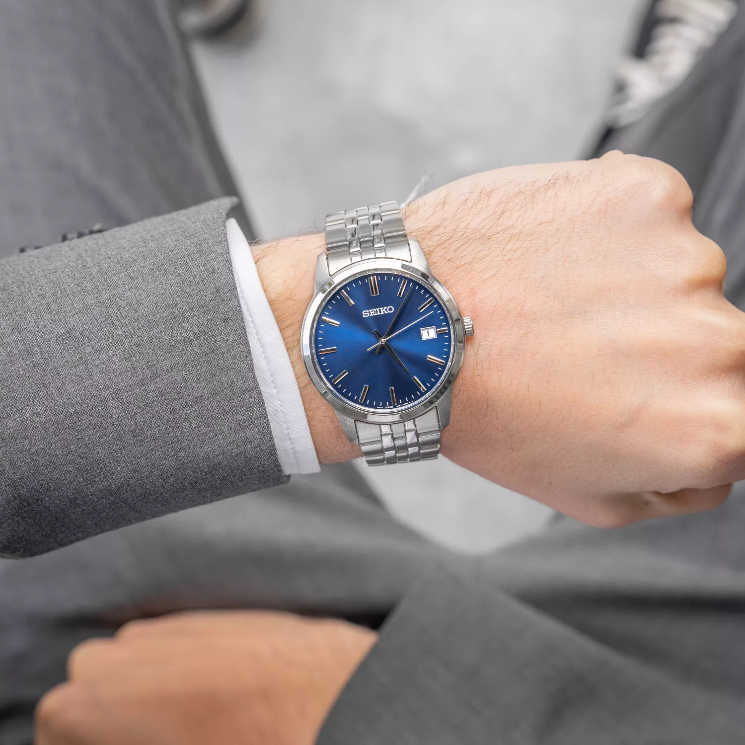Seiko Essential SUR399P1 watch for Manwith Blue dial that measures 40 mm in diameter and has a Silver Metal band watch strap