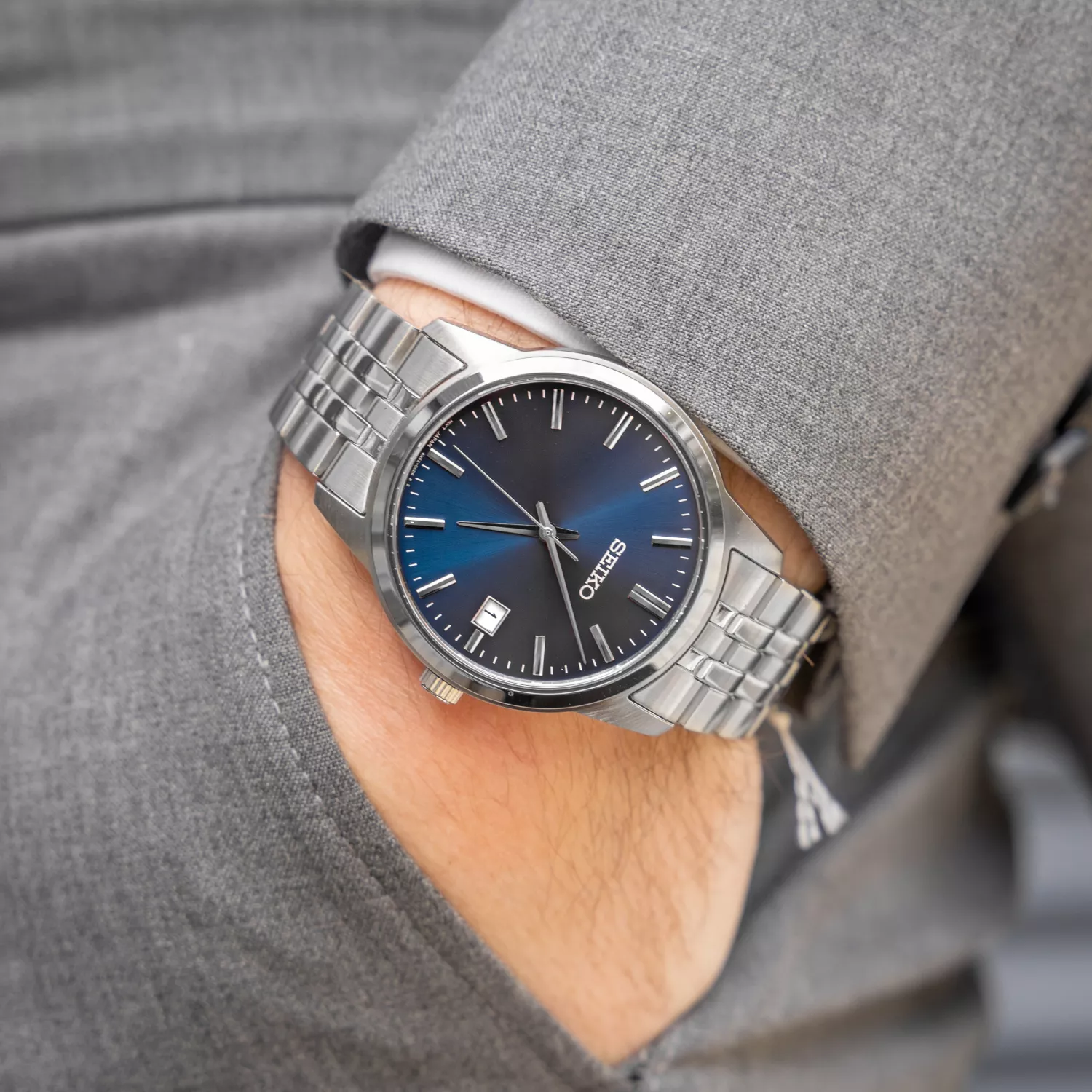 Seiko Essential SUR399P1 watch for Manwith Blue dial that measures 40 mm in diameter and has a Silver Metal band watch strap