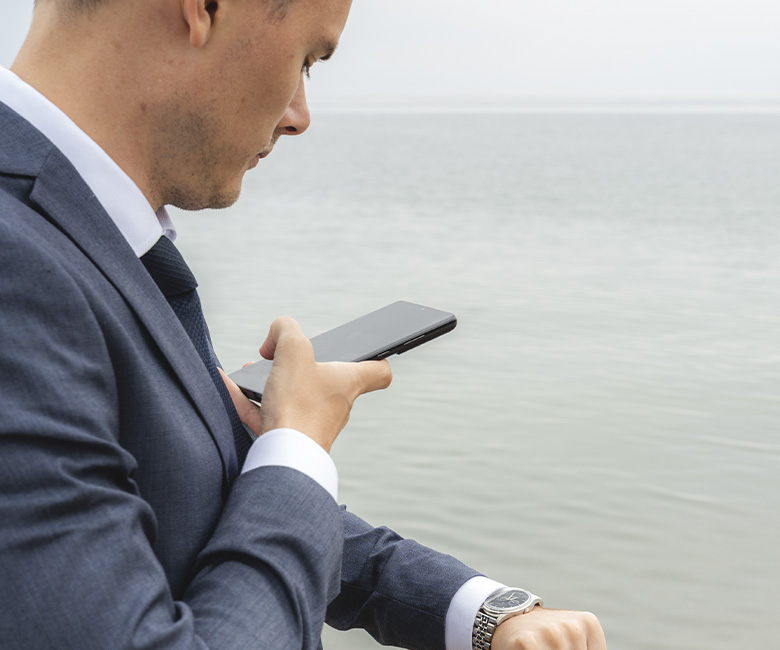 Mikkel taking a picture of his watch